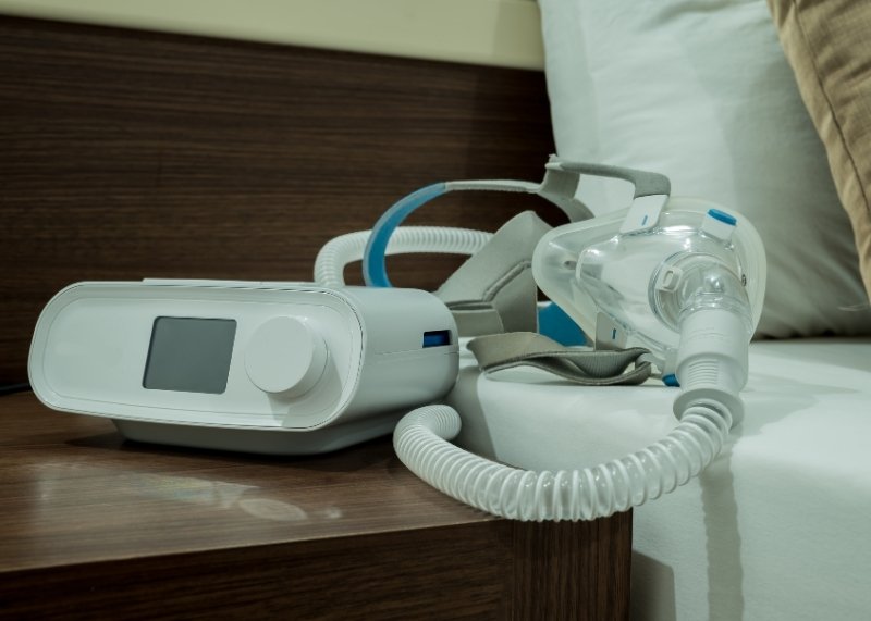 cpap device on bedside table